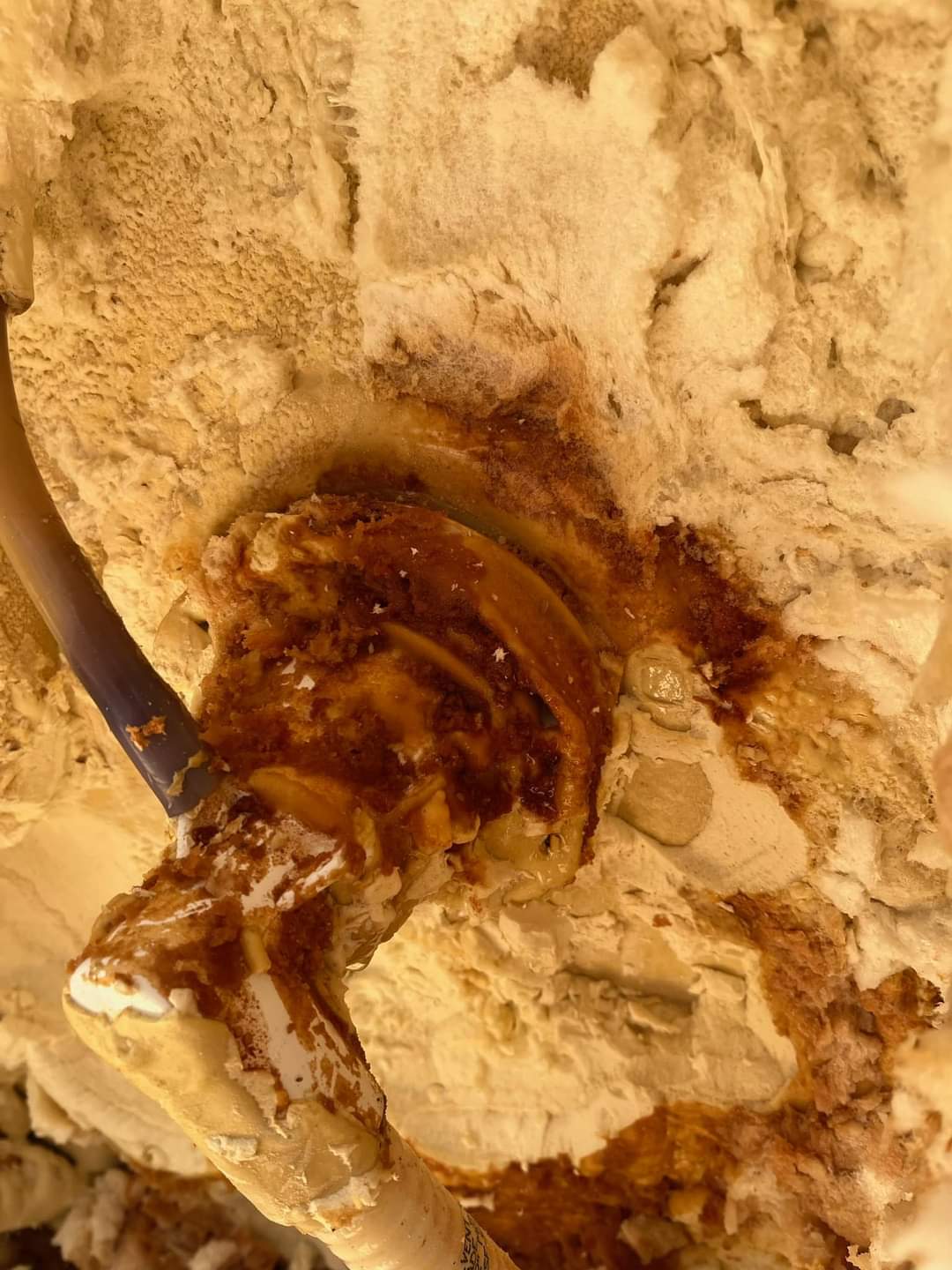 Water damage and rust stains visible inside the foam of a full foam hot tub showing how leaks get trapped and hidden